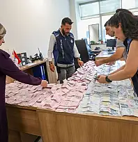 Van'da dilencinin üzerinden çıkan paralar şok etti